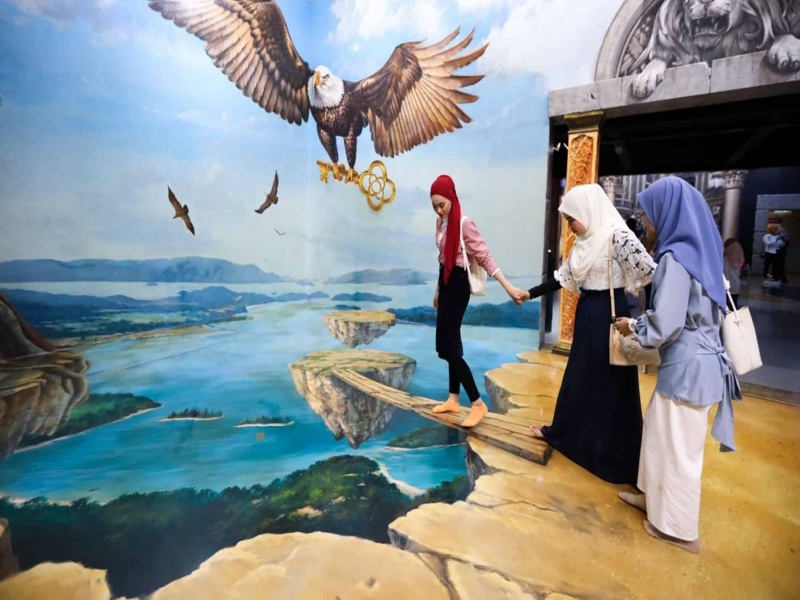 Tourists experiencing 3D Art Langkawi 